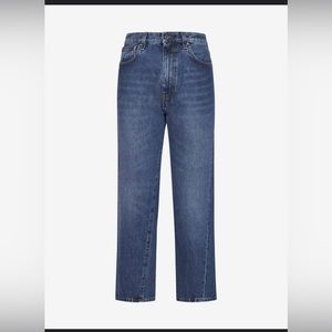 Totême twisted seam denim in medium wash